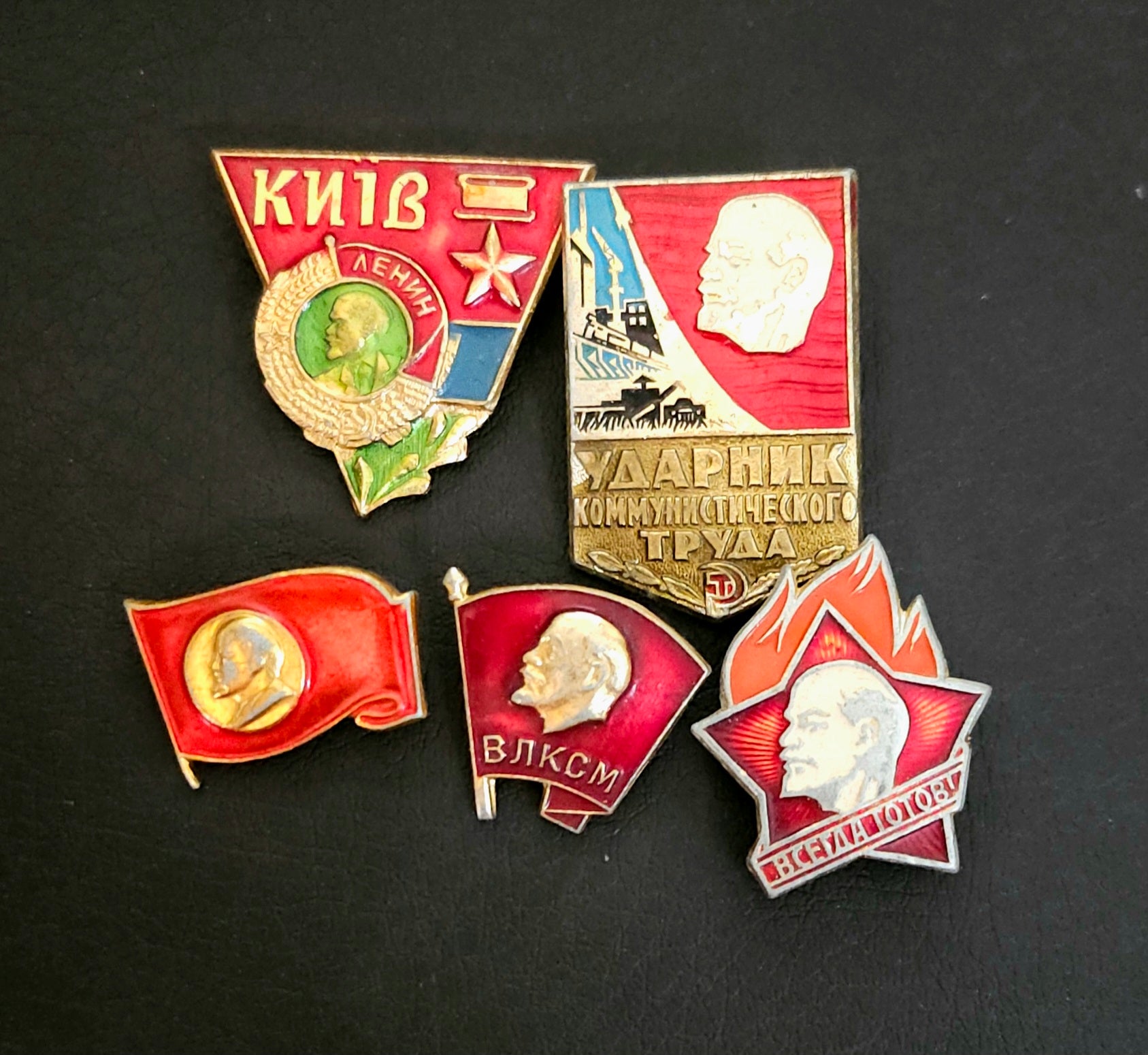 Five carious Soviet pins with Lenin on them