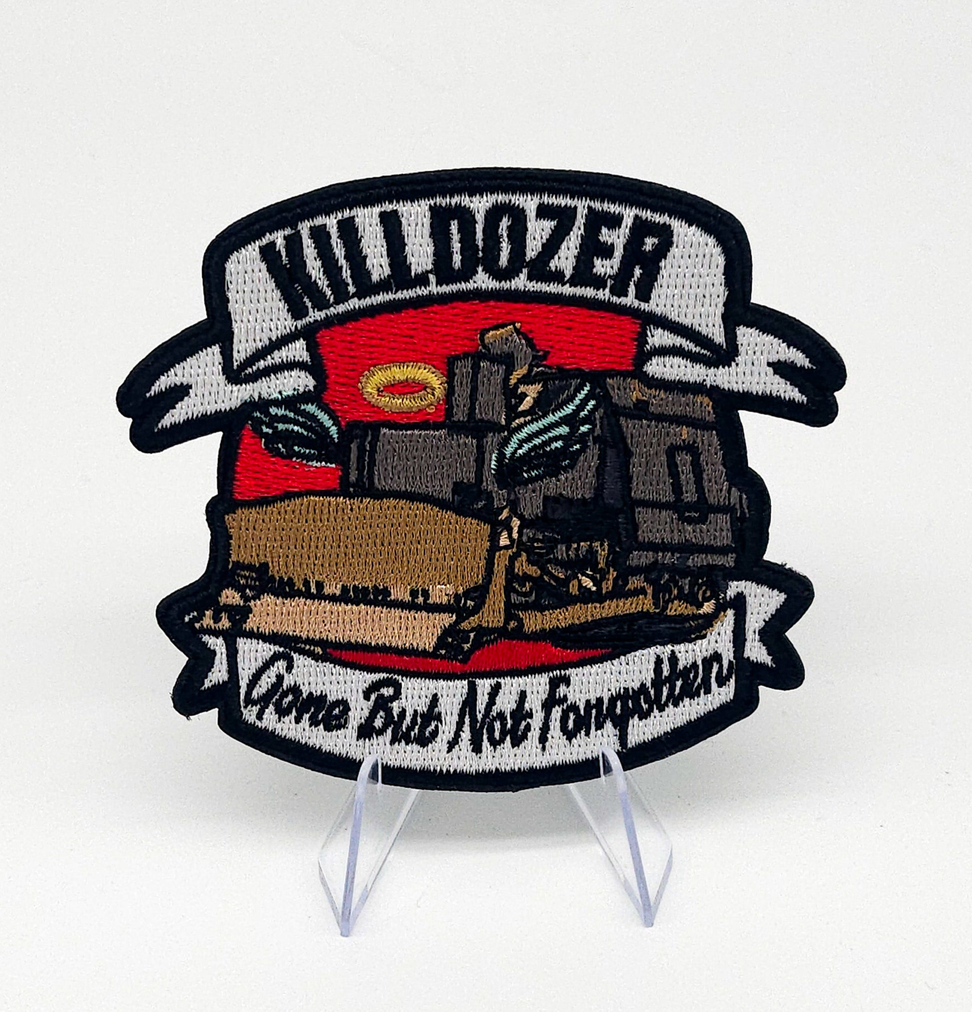 Embroidered patch with 'Killdozer' design on a white background