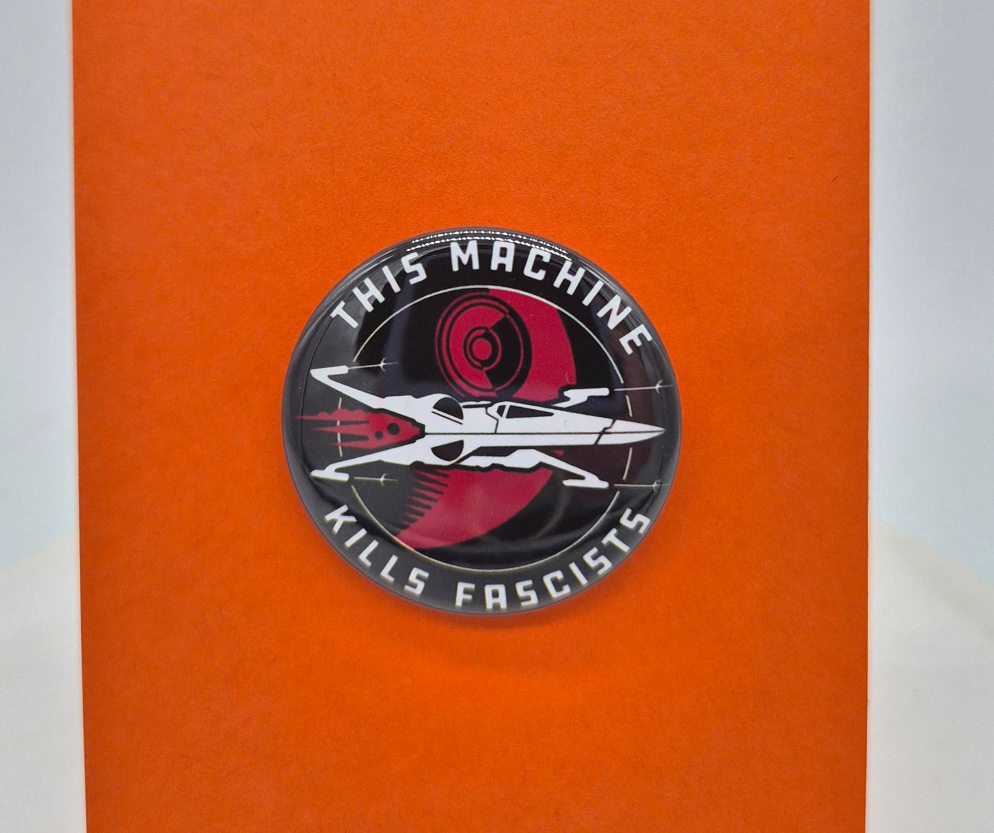 This machine kills fascists button
